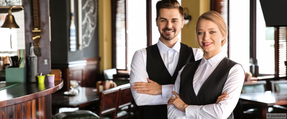 Host welcoming guests at entrance